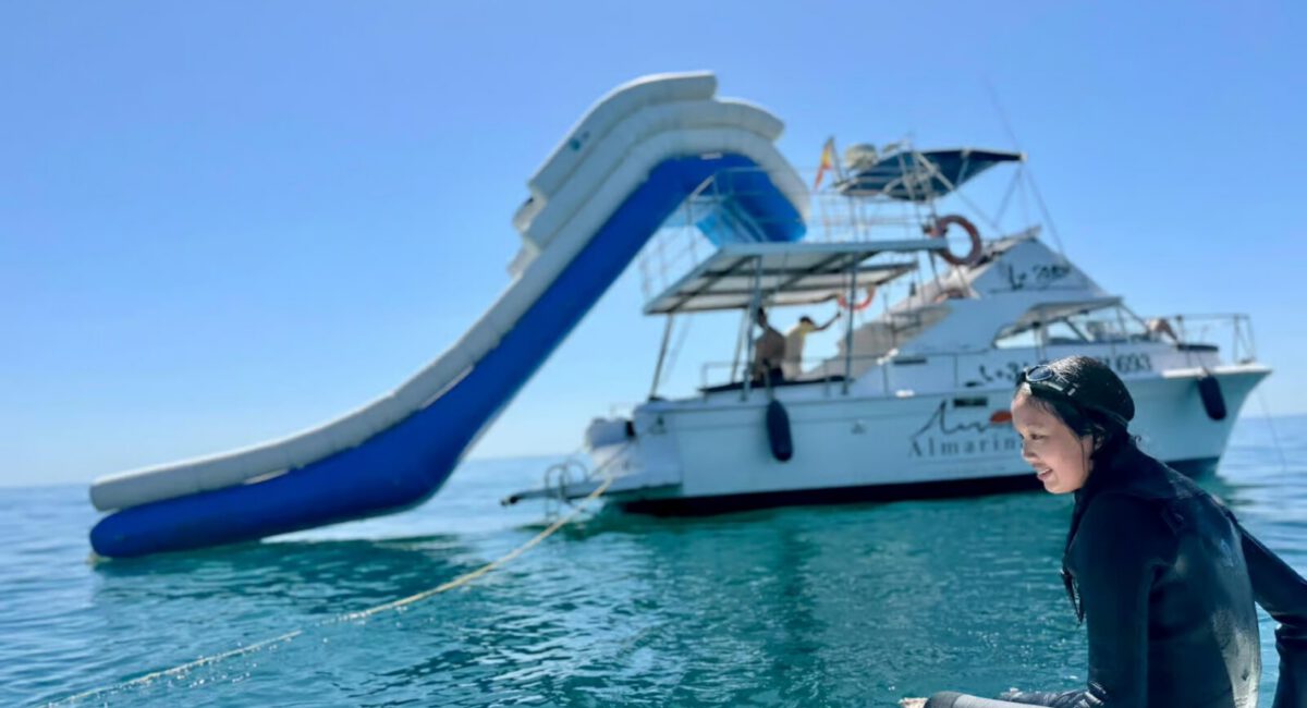 a water slide attached to a boat