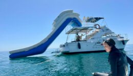 a water slide attached to a boat