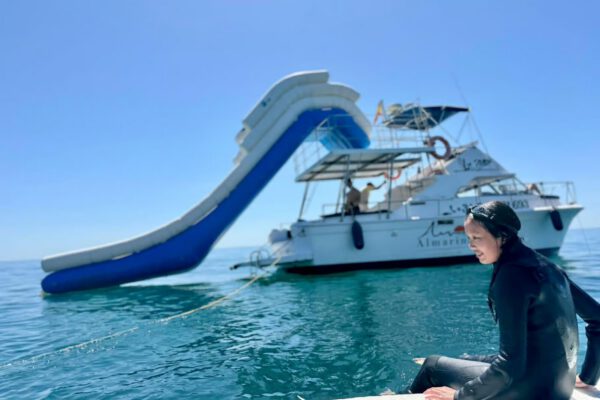a water slide attached to a boat